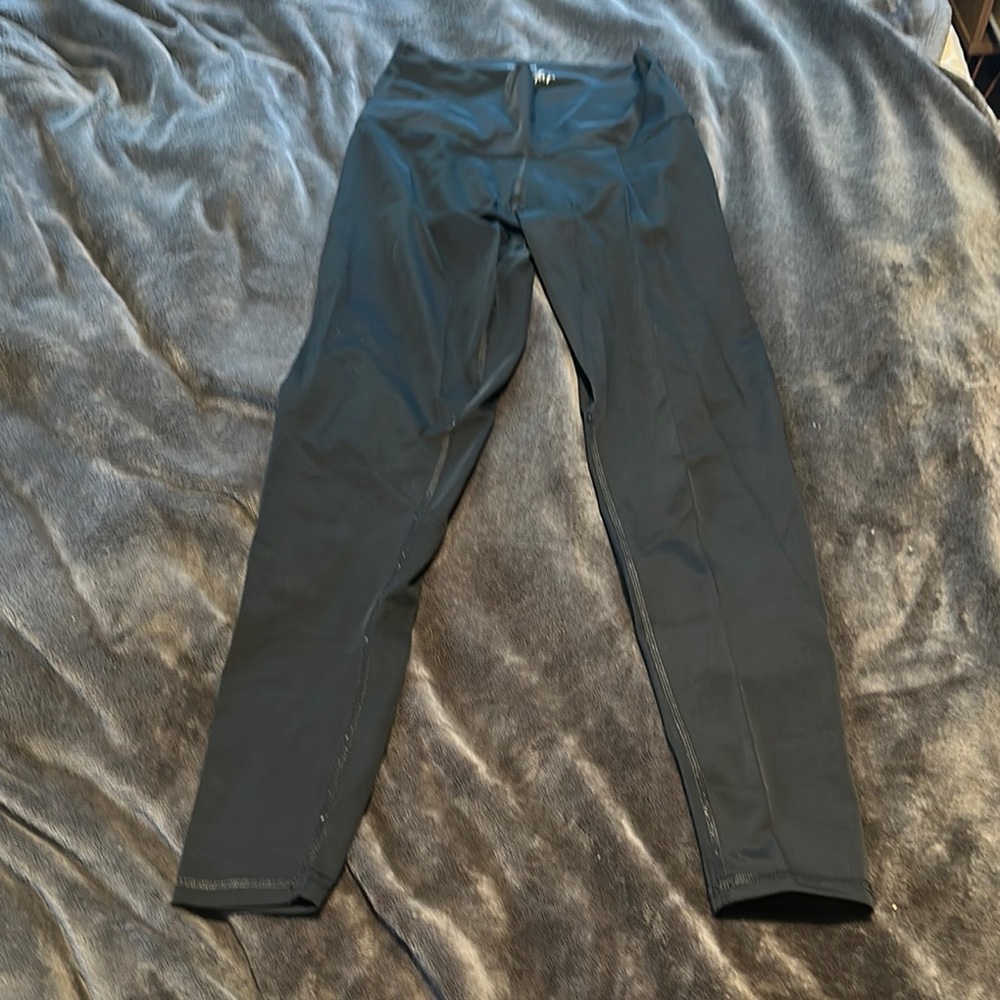 Woman’s shiny Black leggings nwot